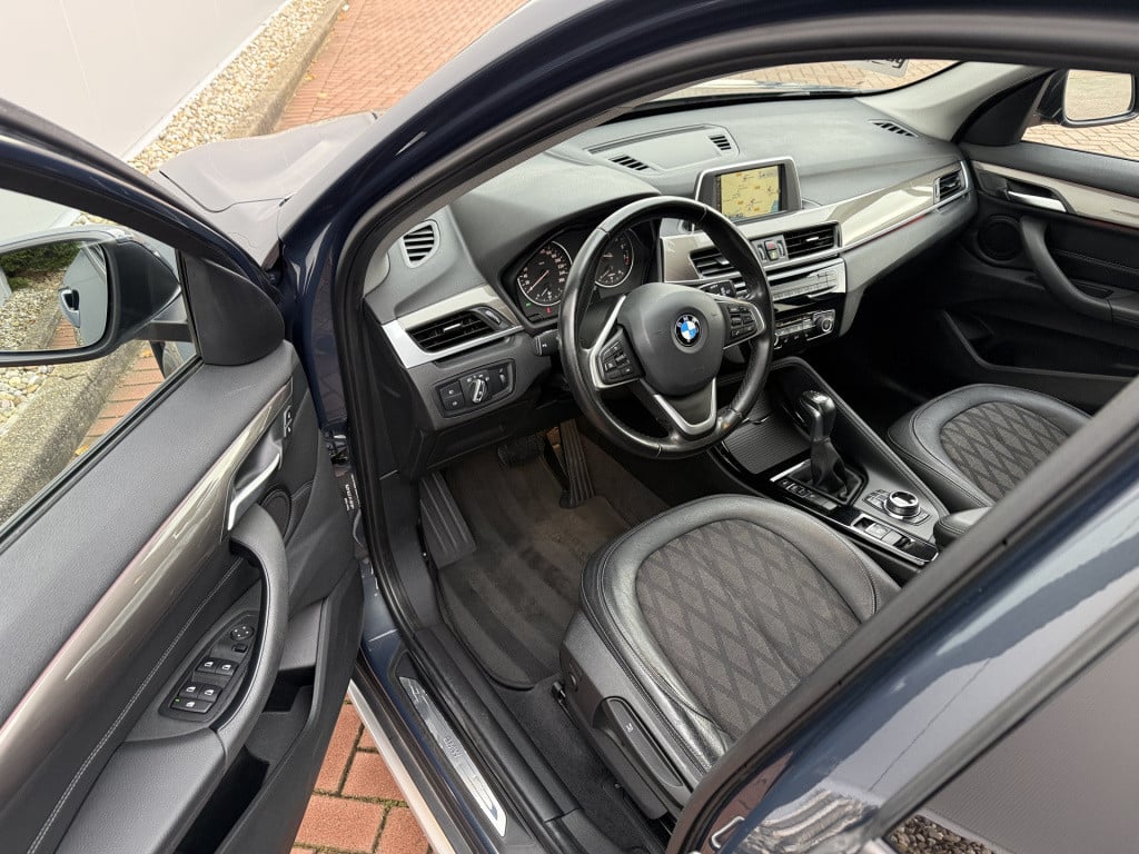 BMW X1 sdrive18i 136pk high executive automaat