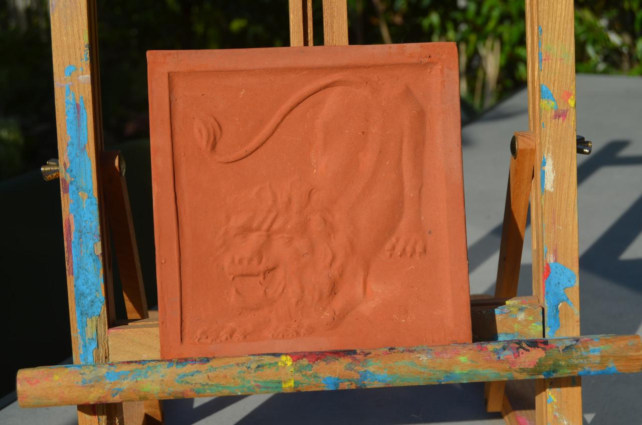 Verschillende terracotta tegels Sterrenbeelden/ Zodiac