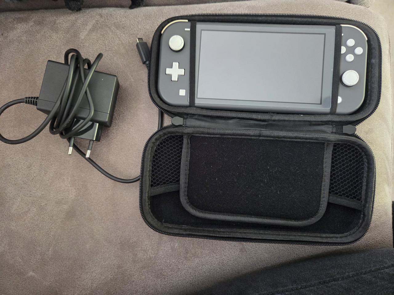 Nintendo Switch Lite grijs en geel evt. incl. spellen