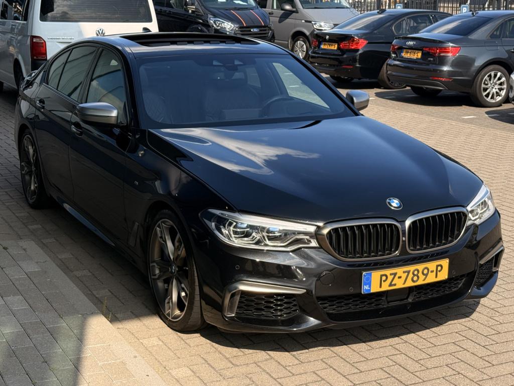 BMW 5 Serie m550i xdrive high executive | 4ws | soft-close | pano | b&w | m