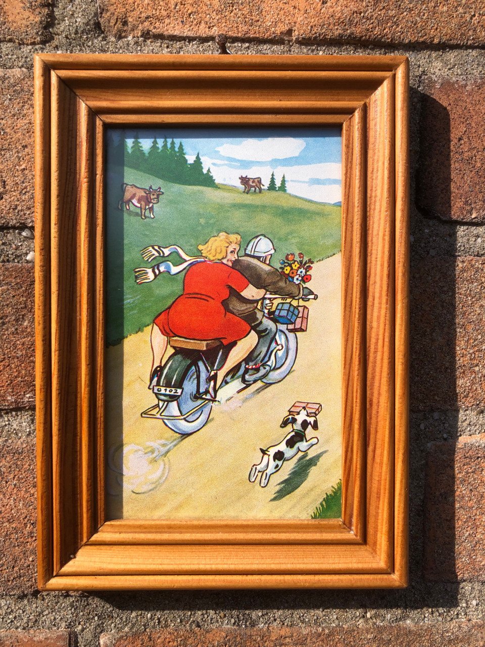 Leuk lijstje met vintage prentje met een motorfiets.