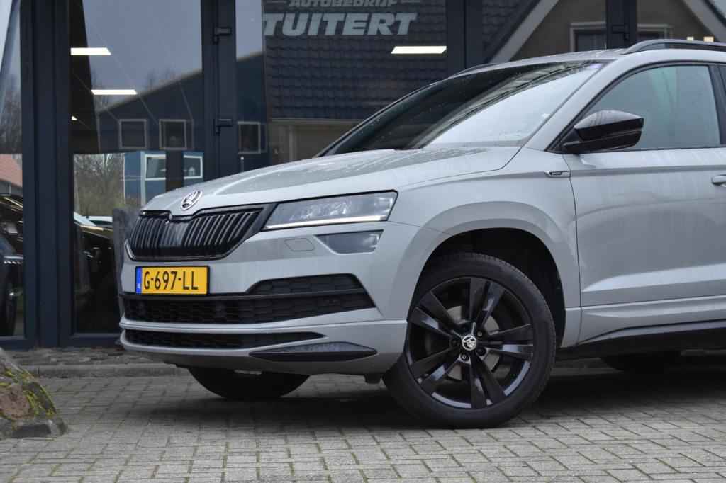 Skoda Karoq 1.5 tsi act sportline | trekhaak | camera | nap | canton | appl
