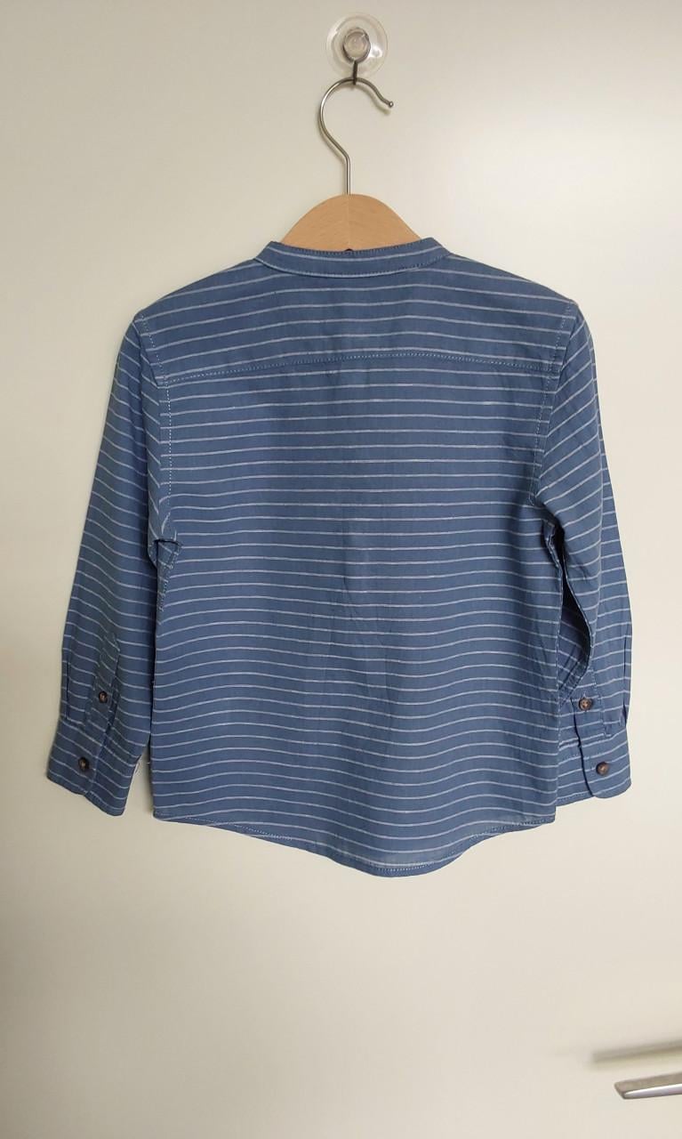 Lichtblauwe gestreepte blouse van het merk C&A in maat 104