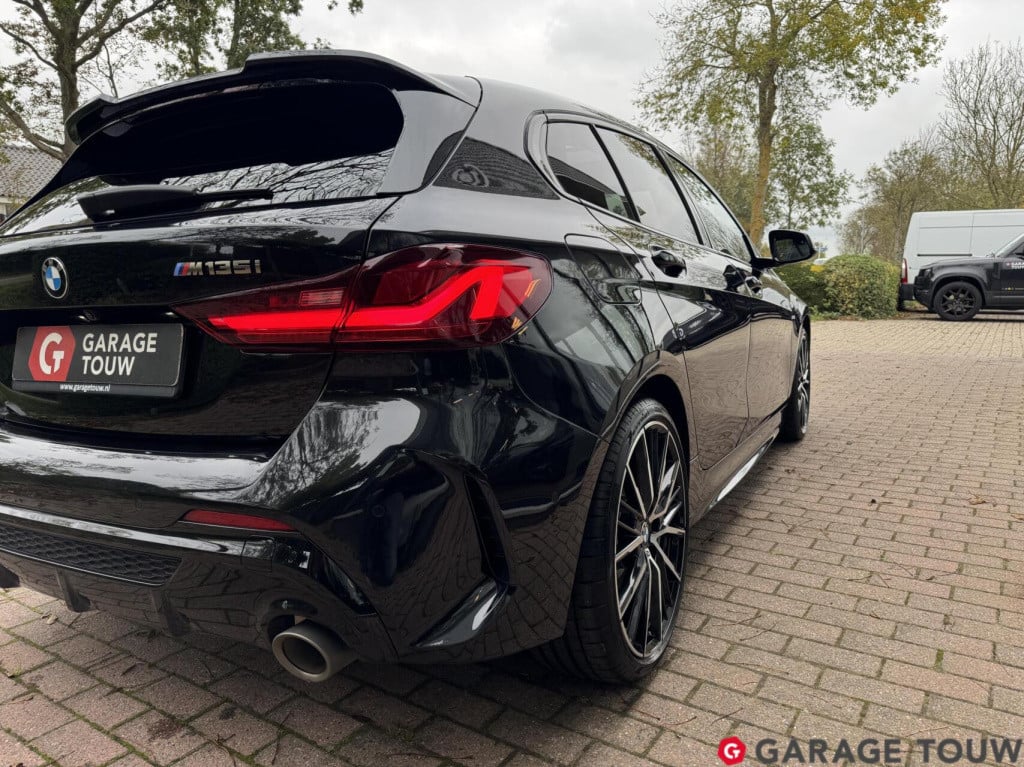 BMW 1 Serie m135i xdrive high executive edition pano orig.nl