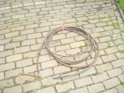 Heel oude metalen ontstopper