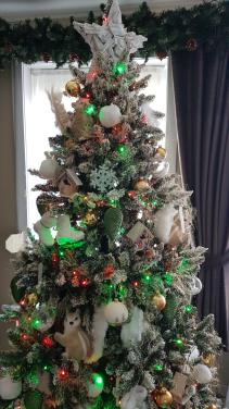 Kerstboom besneeuwd