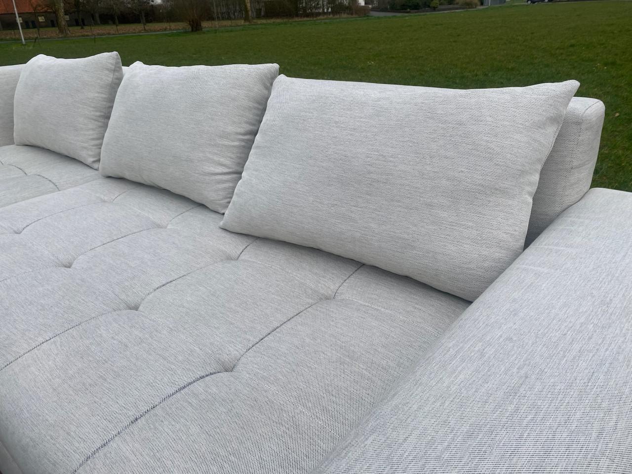 Grijze Stoffen Hoekbank met Hocker – Ruim Loungecomfort–Gratis Levering NL