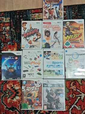 11 WII games en game benodigdheden
