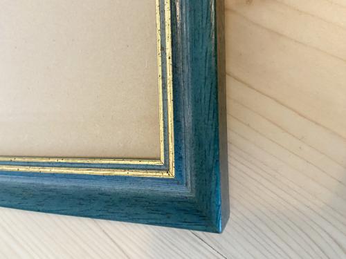 Mooie blauw/goud gekleurde fotolijsten