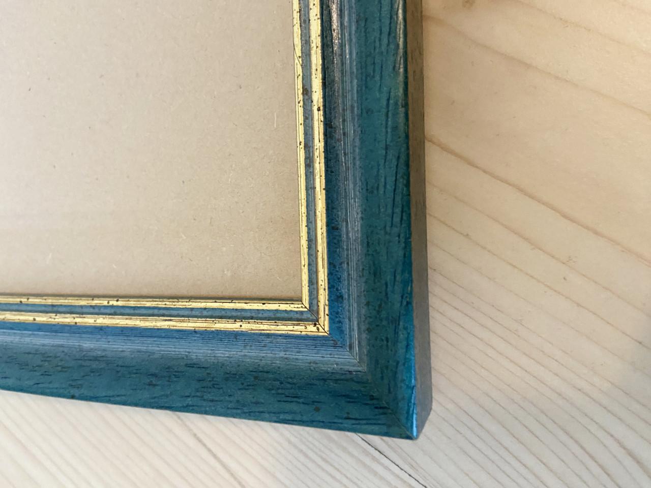 Mooie blauw/goud gekleurde fotolijsten