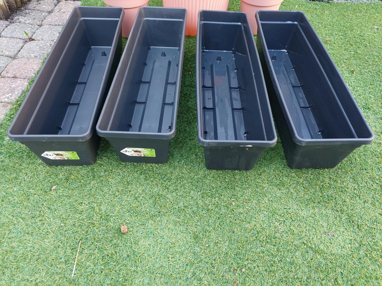 Pakket kunststof bloempotten in zeer goede staat