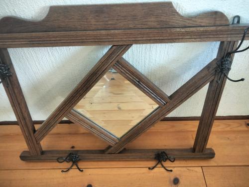 Kapstok met geslepen spiegel