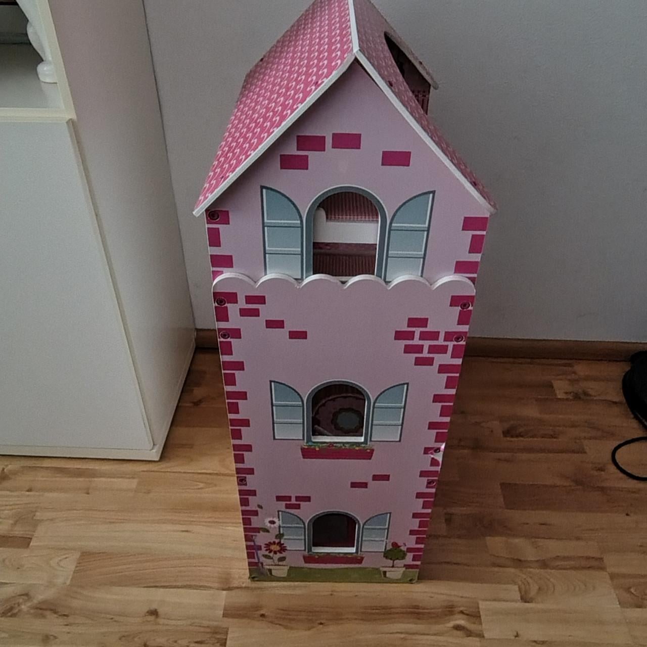 Groot poppenhuis met accessoires