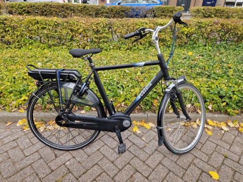Keurig nette Gazelle elektrische heren fiets met Bosch middenmotor