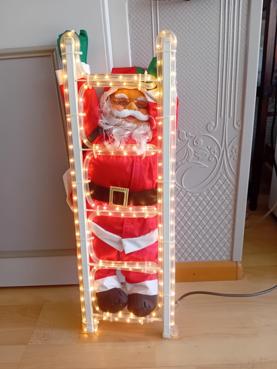 Kerstman op laddertje