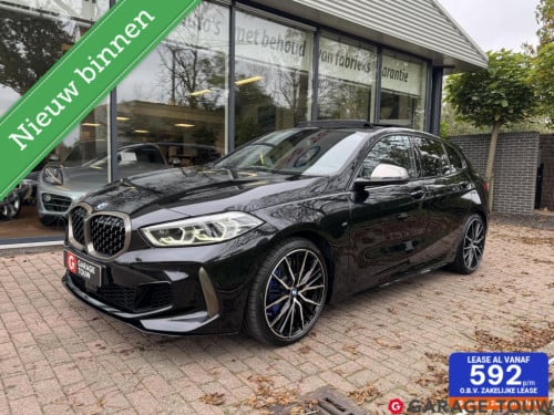 BMW 1 Serie m135i xdrive high executive edition pano orig.nl