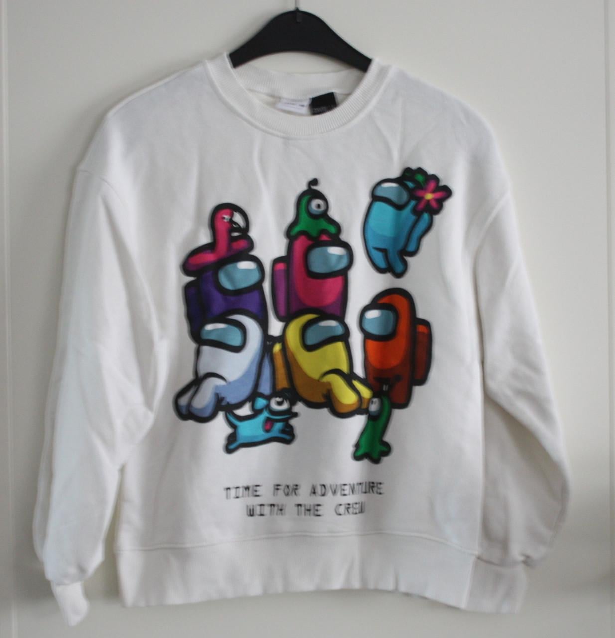 Witte trui met print  maat 152