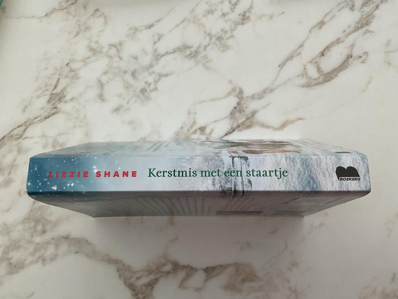 Kerstmis met een staartje. van Lizzie Shane