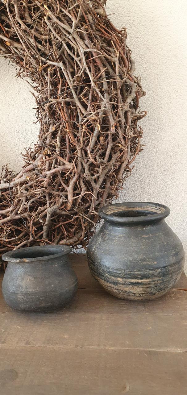 Oude tuimelpotjes prachtig doorleefd