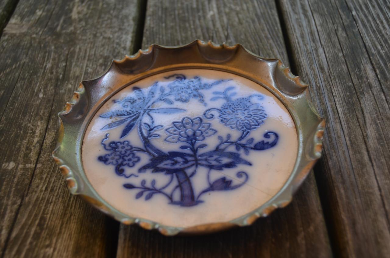 Blauw/wit aardewerk / tin flessenonderzetter