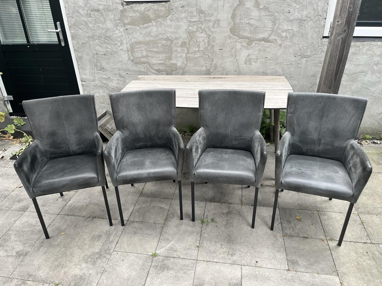 Set van 4 lederen eetkamerstoelen