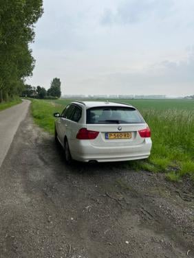 BMW 318i Touring wit uit 2011