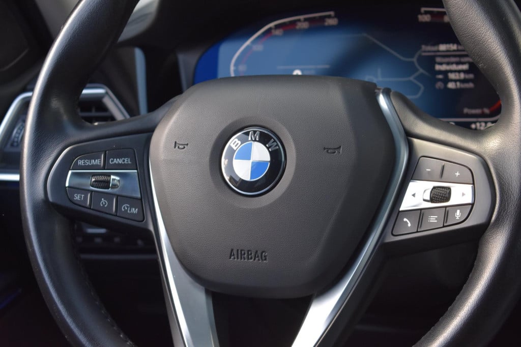 BMW 3-serie 320i high executive | harman kardon | schuif kanteldak | leder 