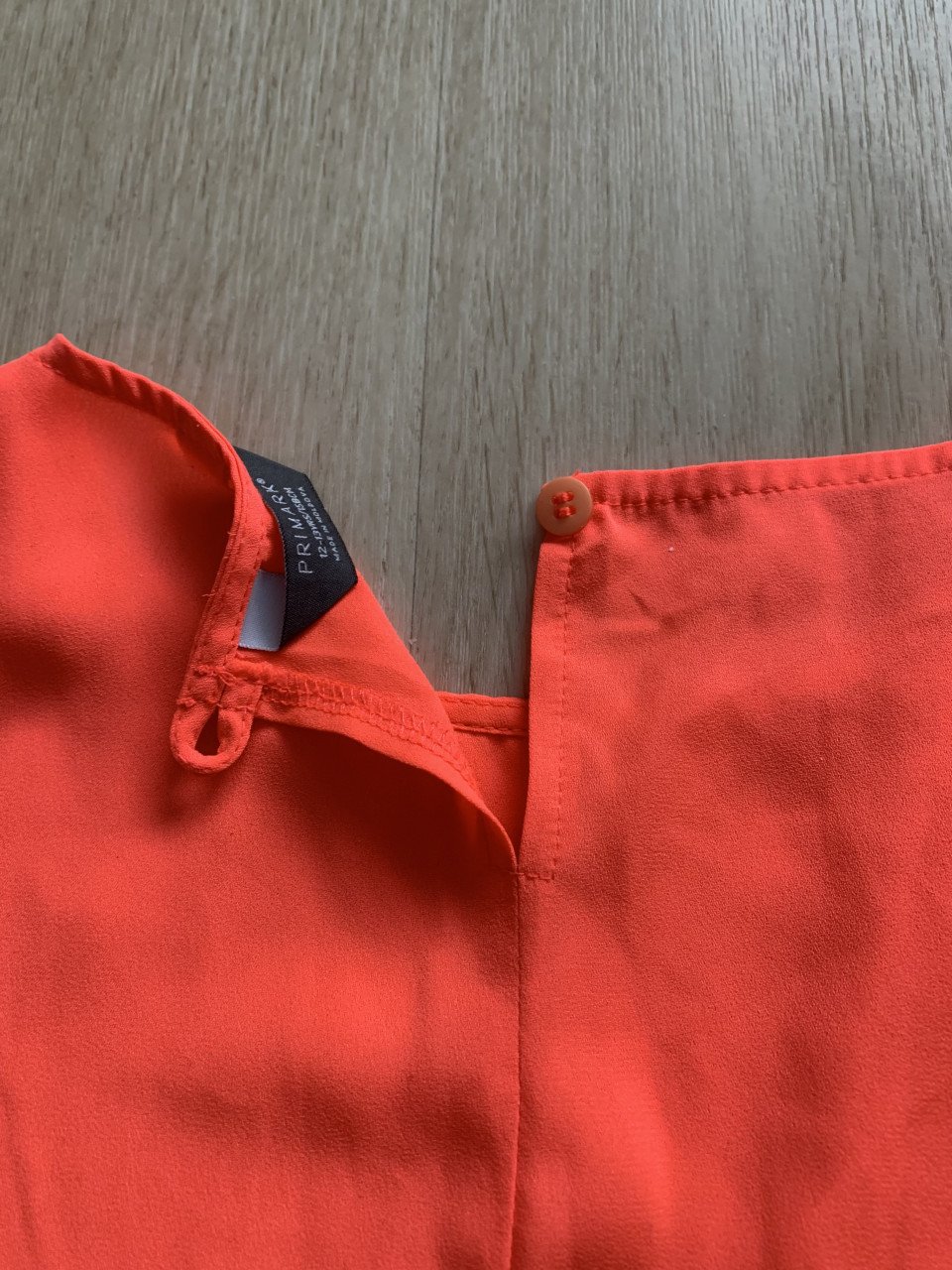 Neon oranje shirt maat 158