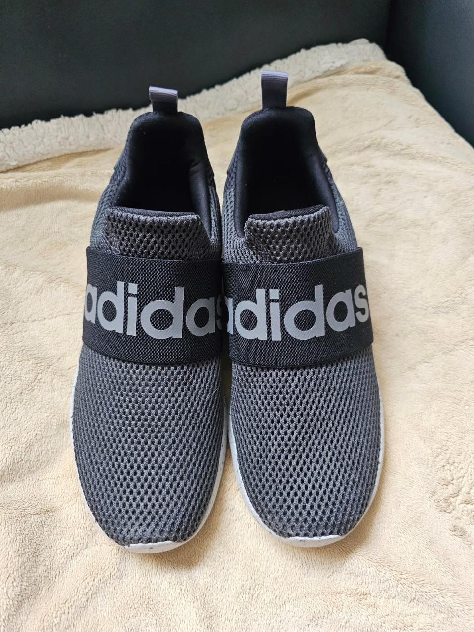 Adidas lite race adapt sneakers.