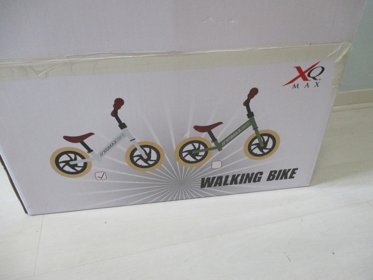 Te koop nieuw in doos 12 " loopfietsje