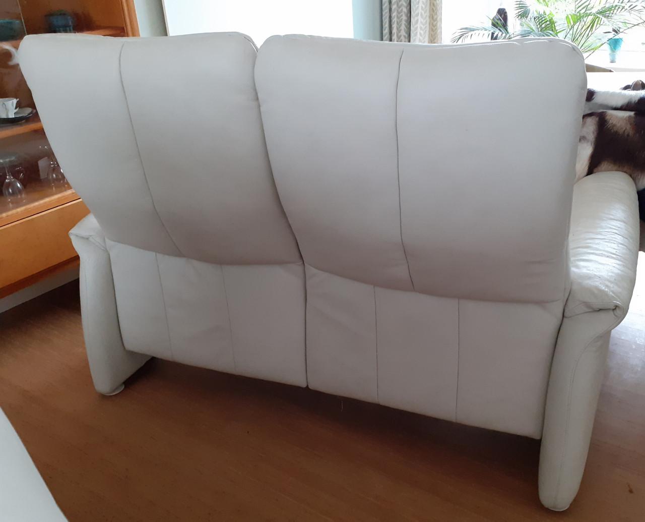 Crème-witte lederen Ergoline tweezitbank en comfortabele Montel fauteuil