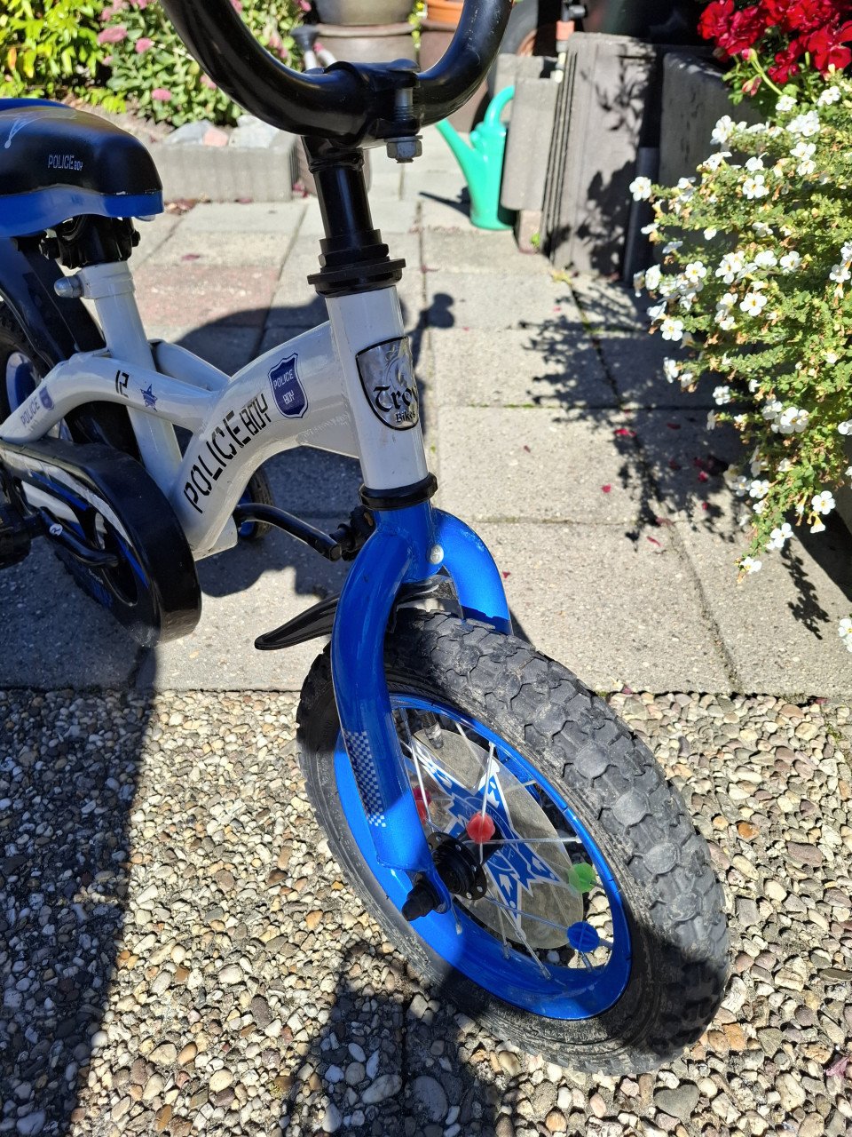Politie fietsje met zij wieltjes