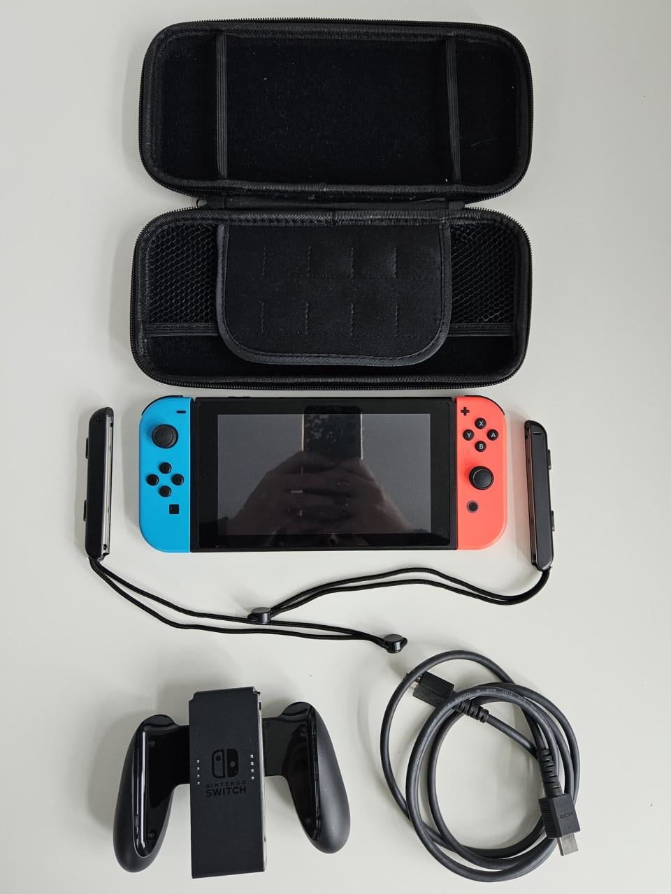 Nintendo Switch met Neon Joy-Cons  in originele doos