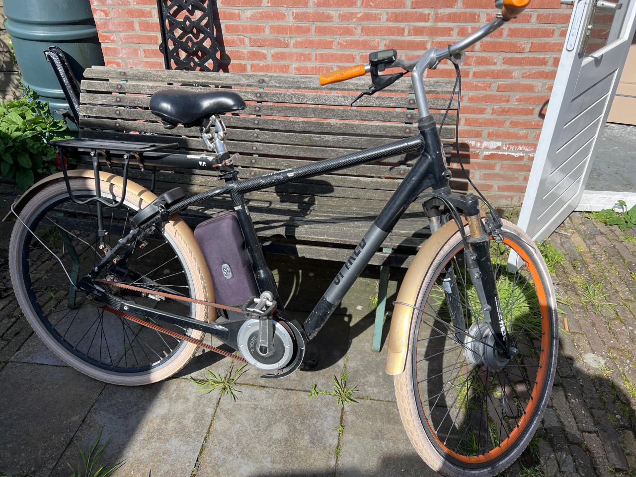 Spiked electrische fiets + lader