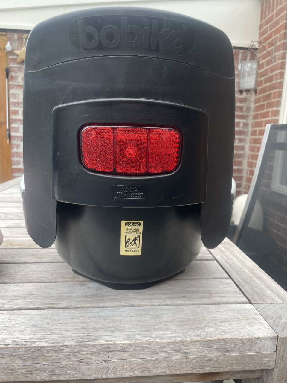 Bobike kinderstoel achterop met helm