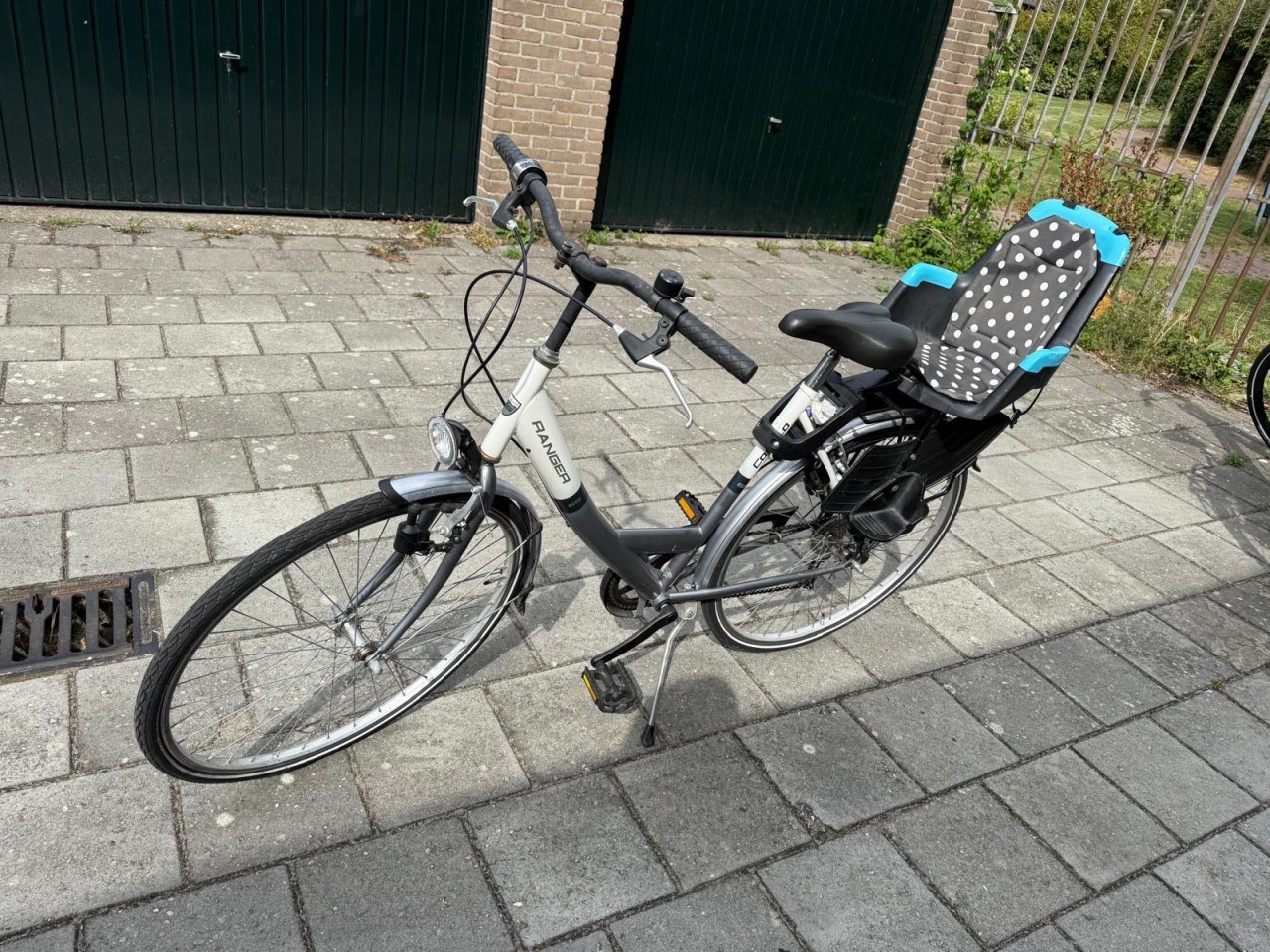Damesfiets met kinderzitje