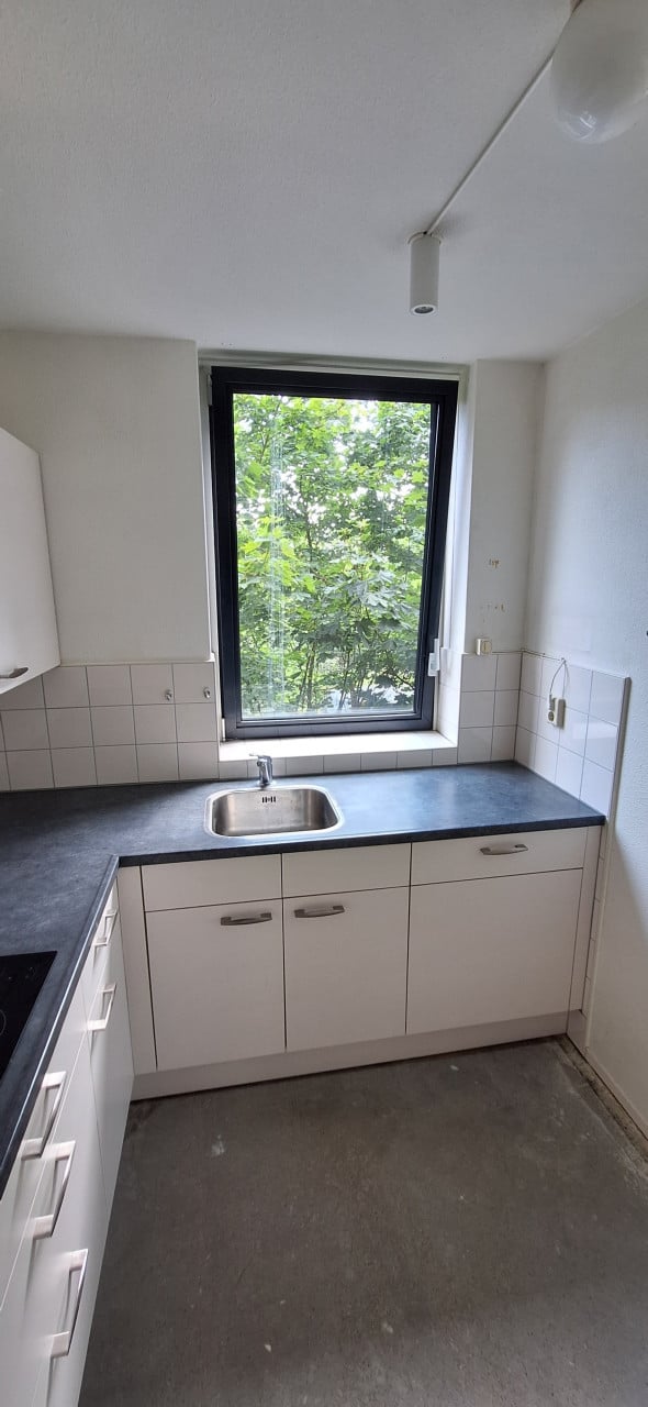 Keuken hoek opstelling met Atag apparatuur