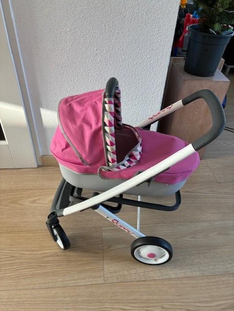 Roze Quinny kinderwagen / buggy (speelgoed poppenwagen)