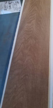 3030-290 ca 9,6 m² houtlook tegels, donker, 20x120 cm, van € 60,45/m² voor