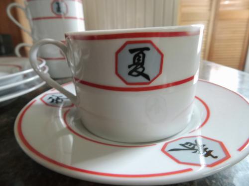 4 Kop en schotels.