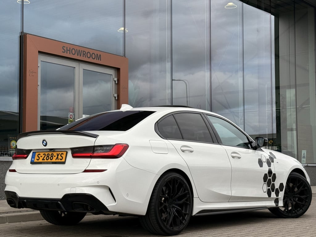 BMW 3-serie 320i m-sport | schuifdak | acc | leder | memory | laser | 20 in