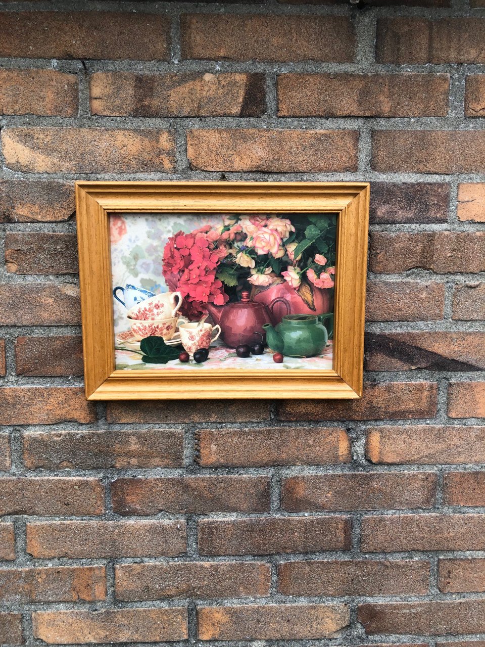 Mooie print in gelijst achter glas.