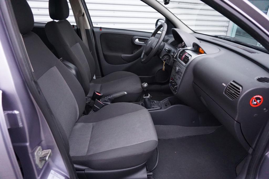 Opel Corsa 1.2-16v silverline airco / cruise controle / lm velgen