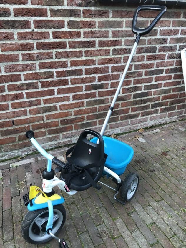 Driewieler Puky met duwstang