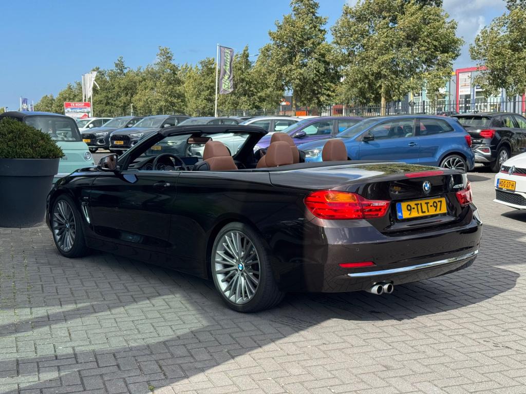 BMW 4 Serie cabrio 428i high executive * nl auto nap * stoel + nek verwarmi