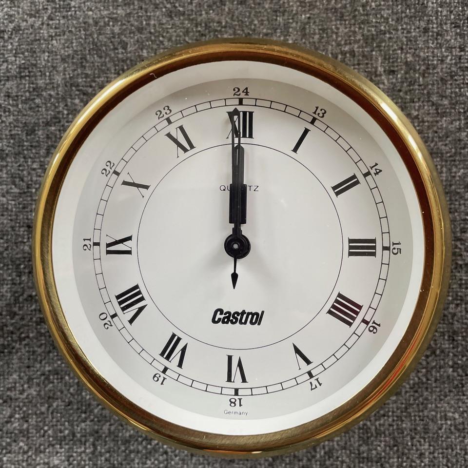 Koperen klok en barometer voor op een plezierboot