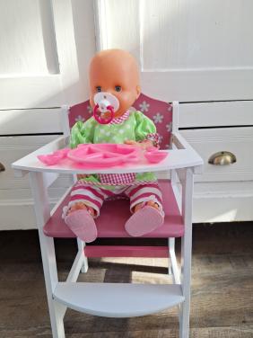 Pop met kinderstoel