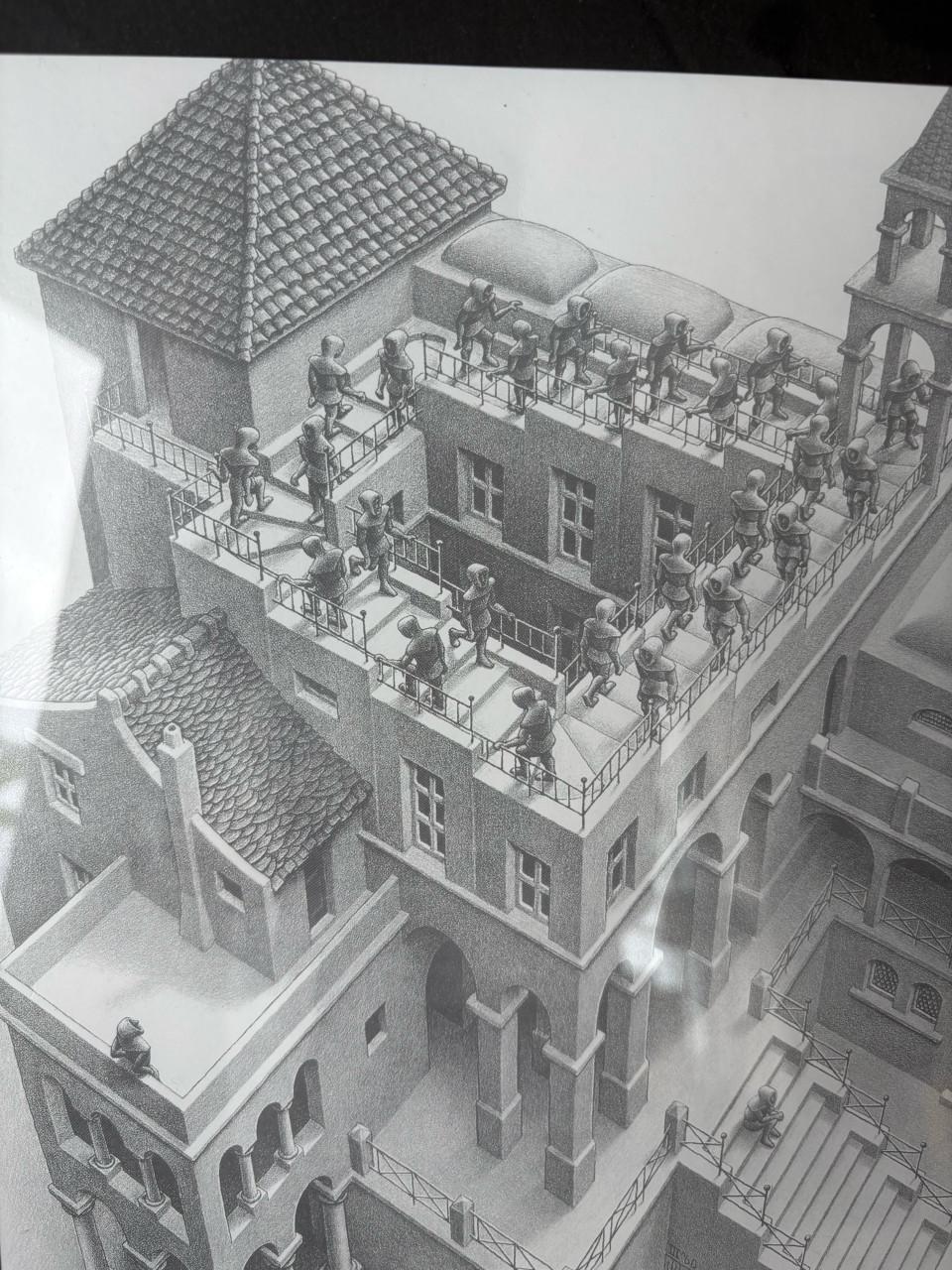 M.C. Escher ,,Klimmen en Dalen,,
