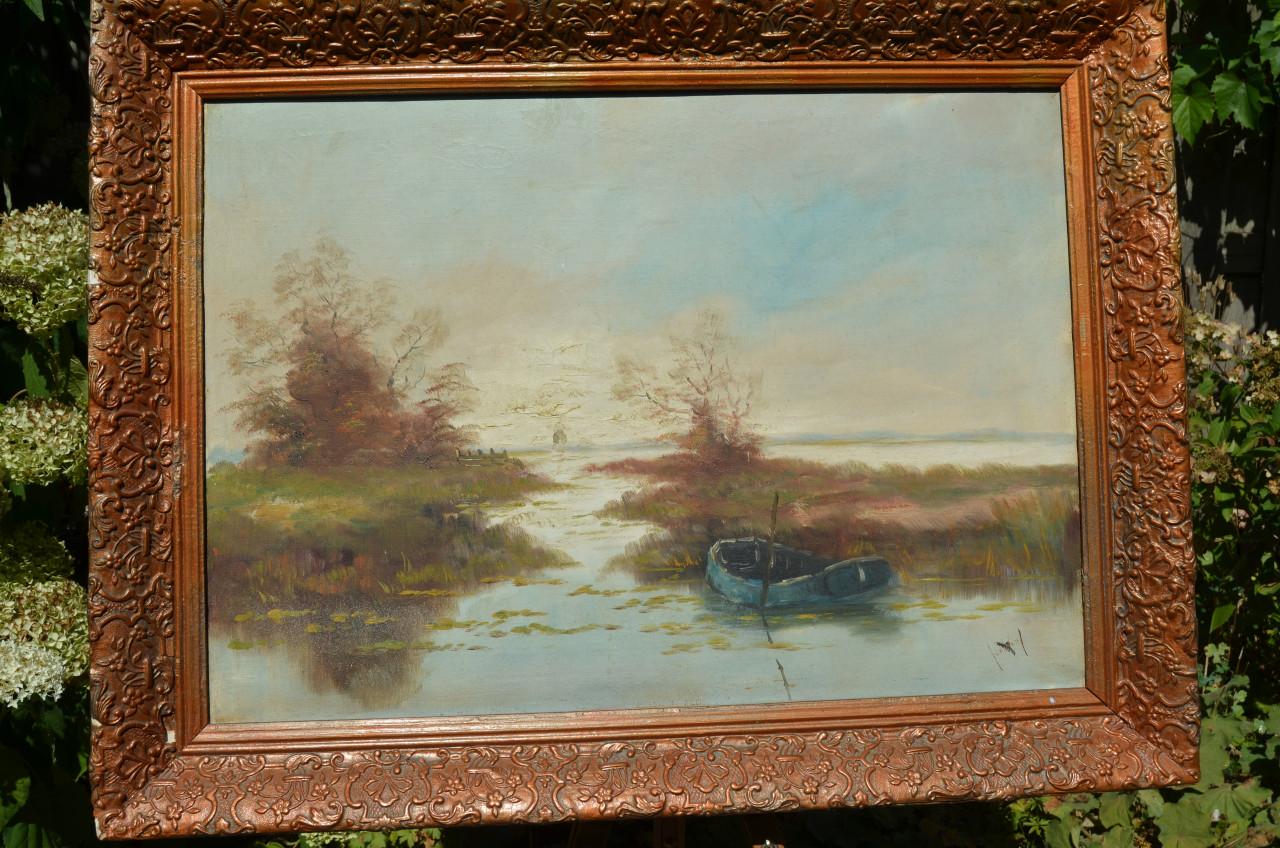 Een bootje in rivierlandschap, gesigneerd