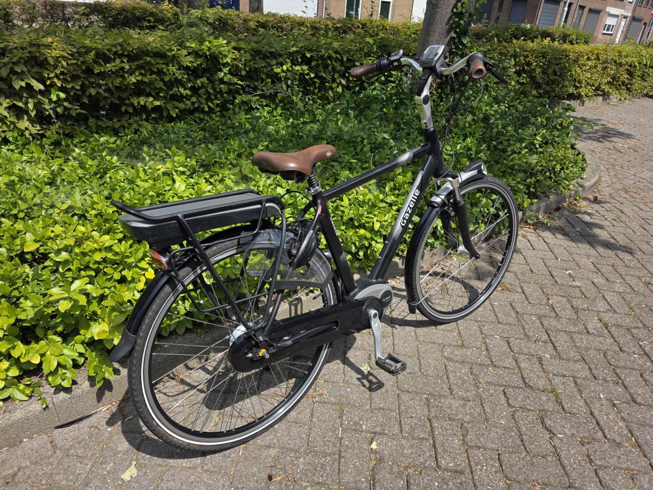 Keurig nette Gazelle elektrische heren fiets met Bosch middenmotor